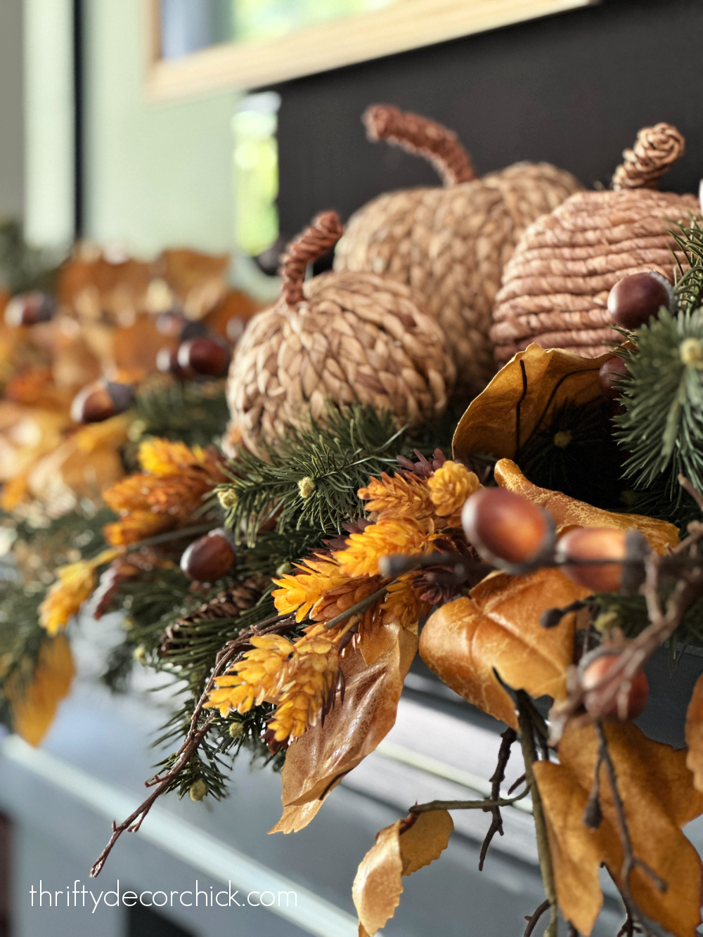 fall mantel with pumpkins